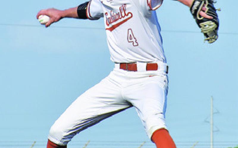 COLBY MARESH OF Caldwell hurls this pitch early in the Booker T. Washington game.