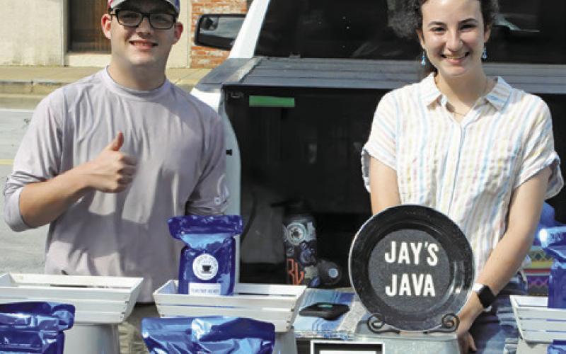 LOCAL COFFEE ROASTERS sell their beans and grounds at the weekly Farmer’s Market in downtown Caldwell on Saturdays. Tribune photo by Denise Squier