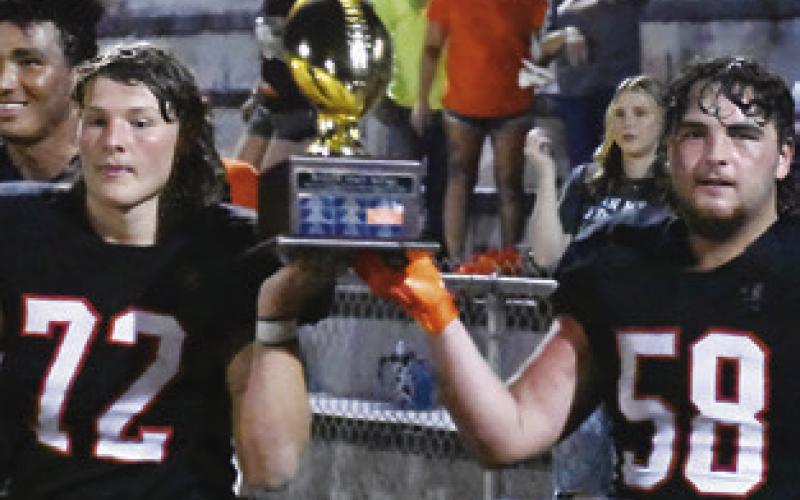 SOMERVILLE’S TREVOR Rosser and Moses Stickel hold the Baker Highway Trophy.