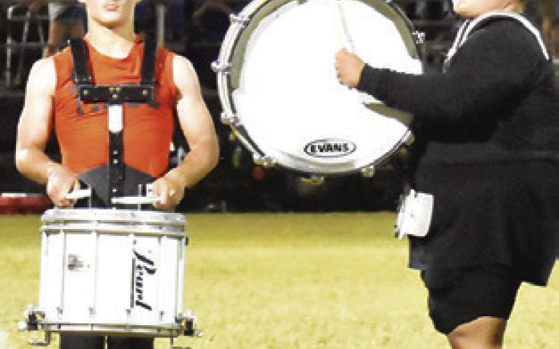 THE SOMERVILLE HIGH School Band percussion session performs at halftime of the Somerville-Snook football game.