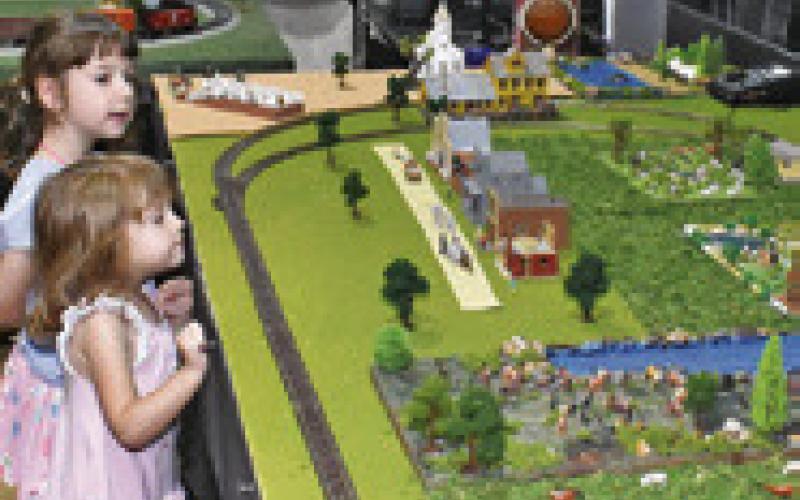 CHILDREN ENJOY the train display at the Depot Museum in Deanville on Saturday, April 25, at the Chisholm Trail Heritage Festival.