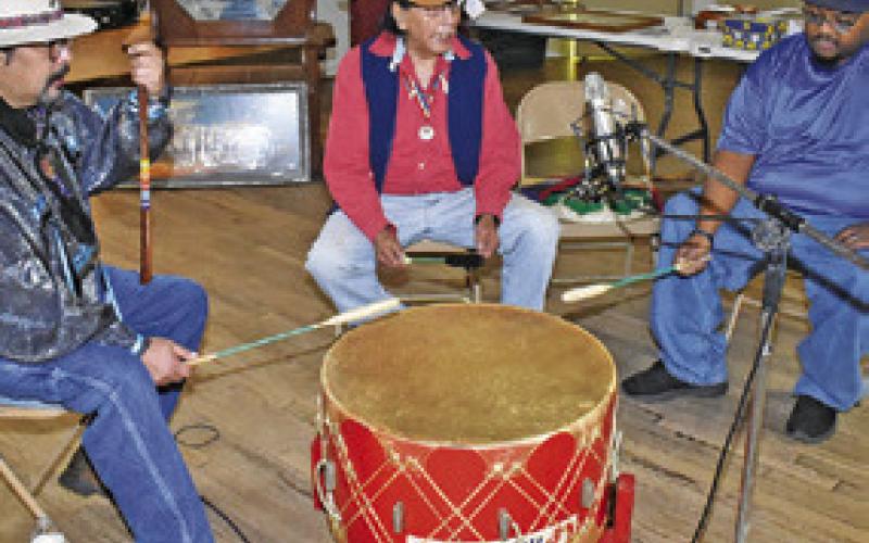 MEMBERS OF THE Caddo/Wichita Indian Tribe play the drum as dancers perform on Saturday, April 25, at the Chisholm Trail Heritage Festival at the Deanville Sons of Hermann Hall.