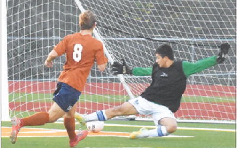 CALDWELL’S DAVID GOFF SCORES ONE of his four goals against Jarrell last Friday.