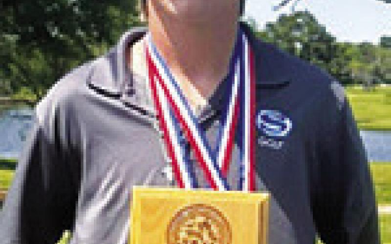 BRETT WITHEM of Snook placed second in the individual scoring at the district golf tournament held on Monday at Oak Grove Country Club in Franklin.