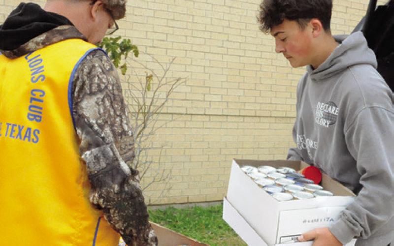 THIS YEAR’S FOOD DRIVE RAISED about $65,000 and over 12,000 pounds of food for three of the county’s food pantries. Tribune photo by Denise Squier