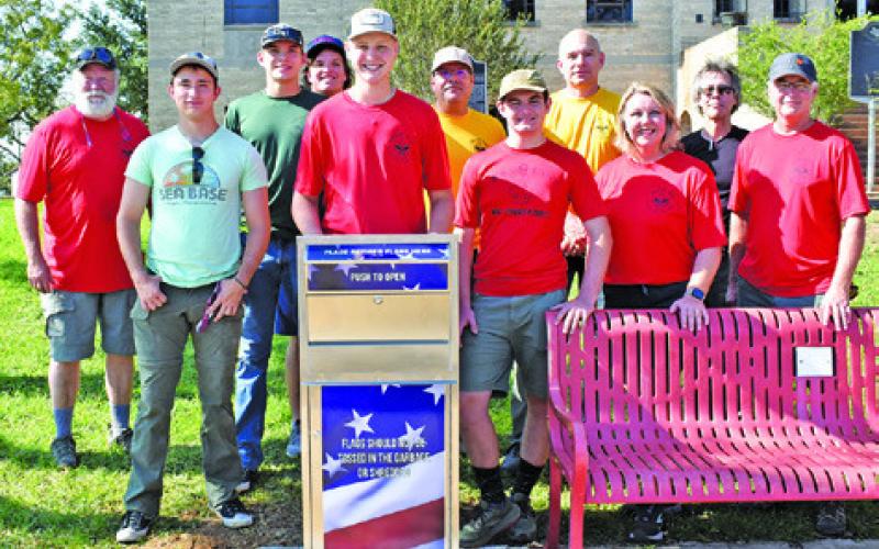 JOINING ALEX YORK, behind the flag retirement box, are front row, from left, John Alford, Jackson Berndt, Raschel York, Jim Berndt; back row, Scott York, Paul Johnson, Walker West, Russell Ramirez, Richard Johnson and David Fackler.