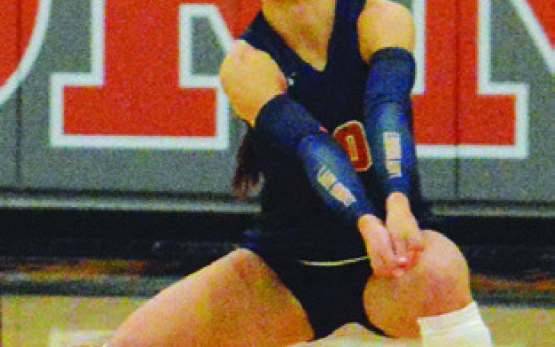 NATALIE EASTEPP lunges to bump the ball during the Lady Hornets’ win over Anderson-Shiro at home on Friday. Tribune photo by Kimberly Hutcheson