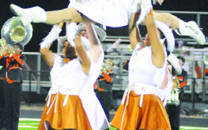 THE CALDWELL HIGH School Honeybees perform at halftime of the Caldwell-Jarrell football game in Jarrell.