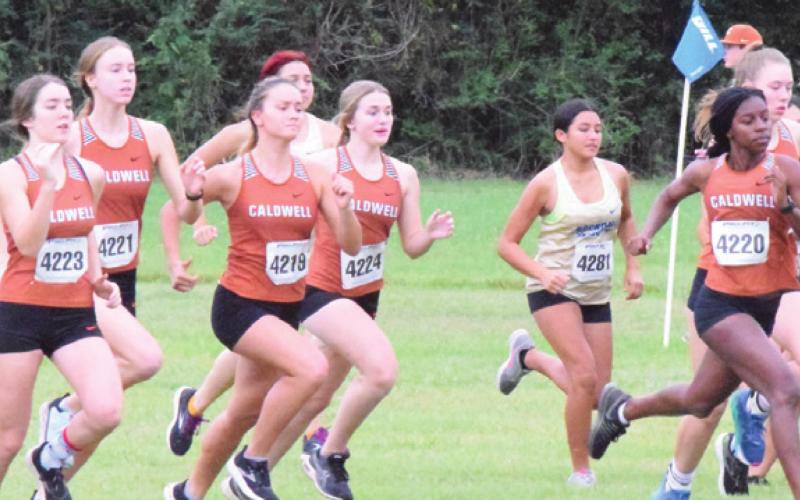 THE CALDWELL GIRLS VARSITY cross country team placed second at the District 19-3A meet last Wednesday at Davidson Creek Park in Caldwell. -- Tribune photo by Denise Squier