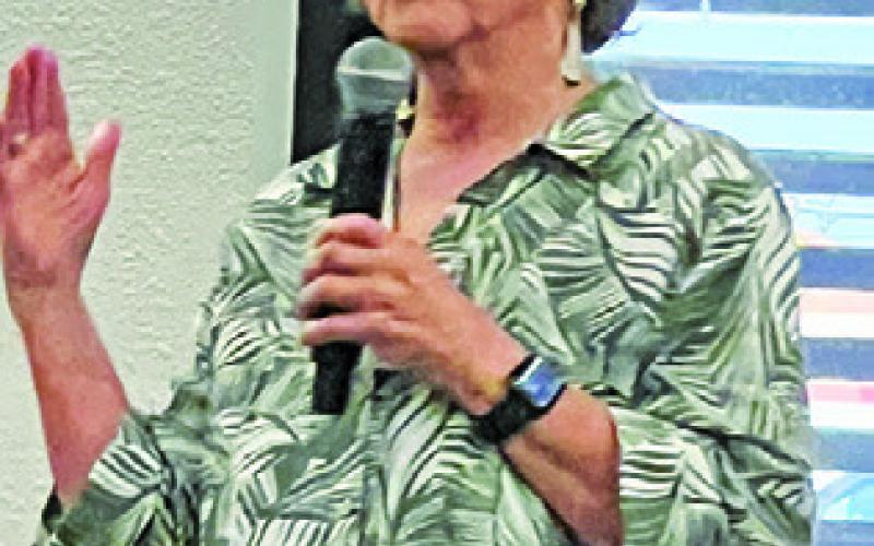 NEWSPAPER LEGEND, Laurie Ezzell Brown, spoke at the Texas Gulf Coast Press Association Convention after members viewed the documentary about her newspaper, The Canadian Record, before it closed. Tribune photo by Denise Squier