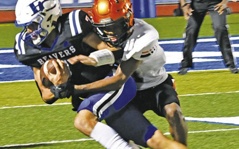 A SOMERVILLE Yegua defender makes a tackle against Falls City. Somerville lost 45-22 -- Photo by Marian Laskowski