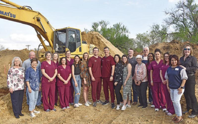 DRGAC DENTAL RECENTLY celebrated the ground breaking of their new office on Gray Street with employees, family members, friends and members of the Burleson County Chamber of Commerce.