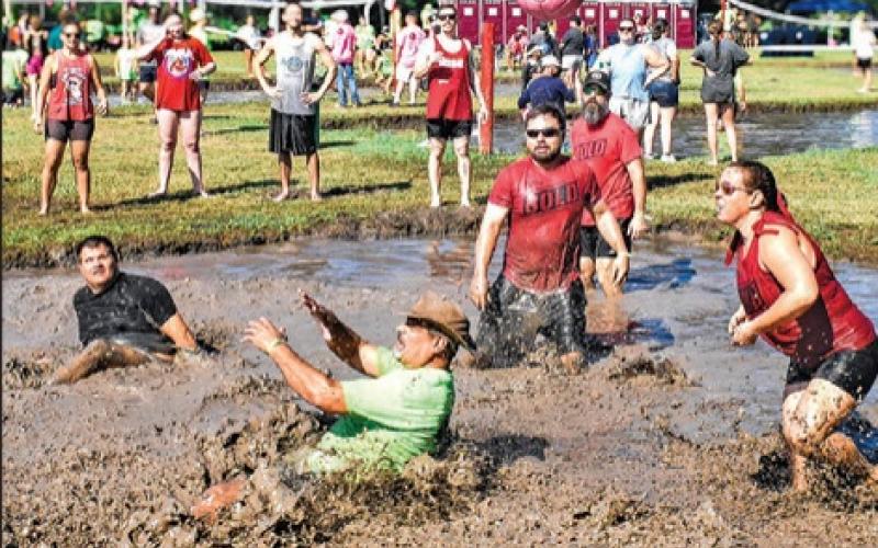 THE ANNUAL HOG Splash and mud volleyball tournament