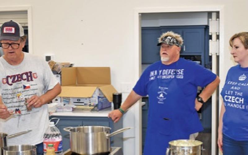 BRUNO SHIMEK ADDRESSES the crowd during this kolache making demonstration