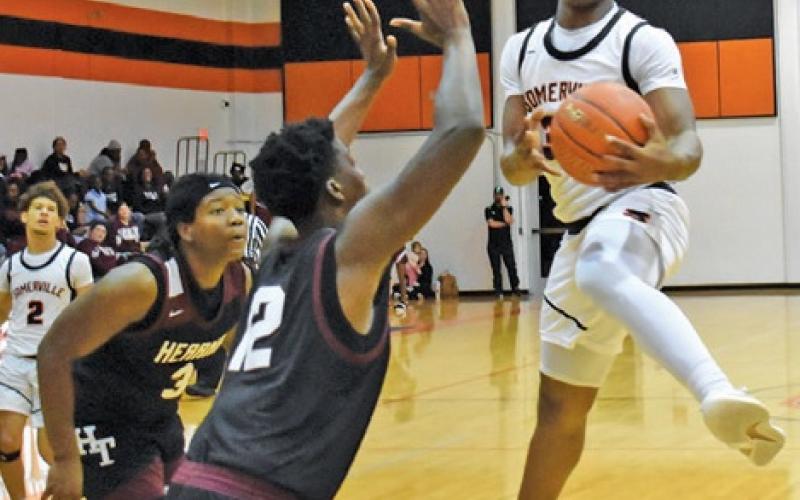 JA’KEITH DANIELS of Somerville grabs this pass on Thursday