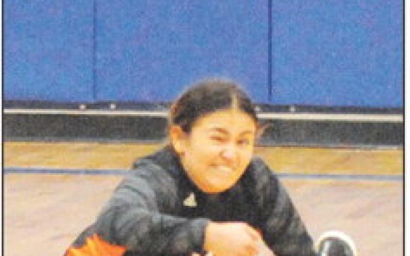 VIVIANNA MUNOZ dives to keep the ball off the floor during Somerville’s win over Dime Box. -- Tribune photo by Denise Squier