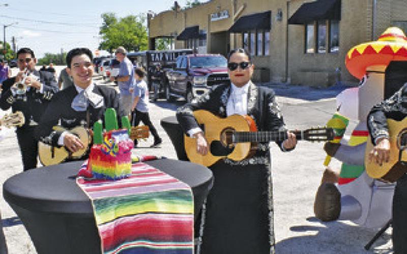 MARIACHI MOSQUEDA OF Bryan entertain the crowd on Saturday, May 2, at the Margarita Fest in downtown Caldwell. Mariachi music is a favorite every year at the festival.