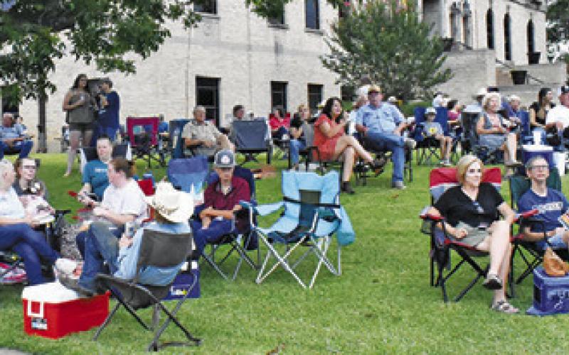 A LARGE CROWD again gathered on Saturday, July 13, for the downtown Caldwell concert and street dance. Tribune photo by Roy Sanders
