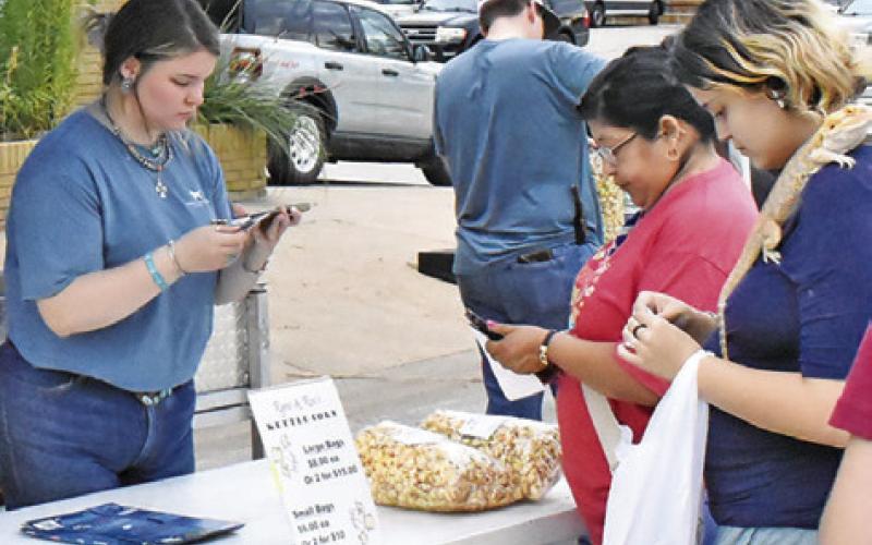 VISITORS ENJOY THE street vendors on Saturday, July 13, at the Caldwell Main Street Second Saturday street dance and concert.
