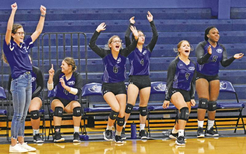 THE LADY JAY BENCH CELEBRATES the team’s home win over Buckholts last Friday 25-20, 25-19, 25-9. Snook also hosted Anderson-Shiro last Tuesday, falling 6-25, 14-25, 17-25.