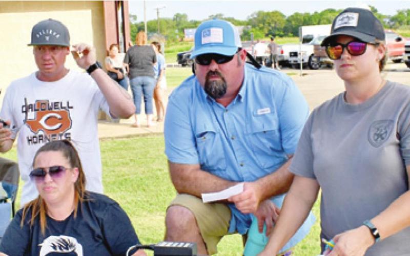 CALDWELL’S LITTLE LEAGUE Softball officials work on Monday, June 21, at the All-Star Tournament in Caldwell. They include, from left, Ashley Plentl, Kevin Teague, Sean Starmer and Elizabeth Rinck.
