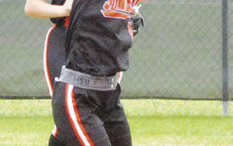 CAYLA BALANGA catches a fly ball during the Somerville-Bartlett game at the Lady Yegua Softball Tournament. -- Tribune photo by Denise Squier