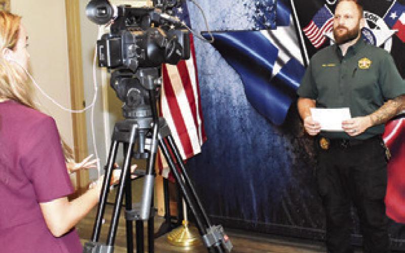 BURLESON COUNTY Sheriff’s Sgt. Randy Jackson makes a statement for the media. Tribune photo by Roy Sanders