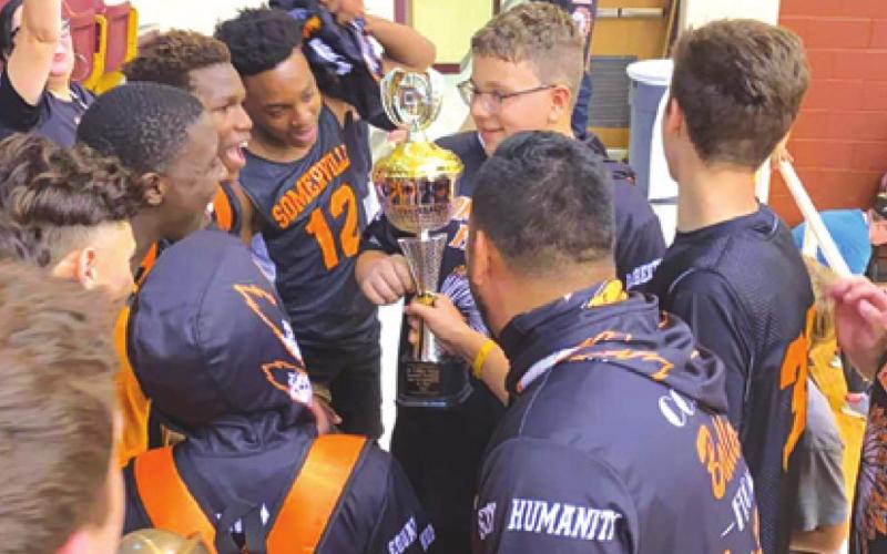 THE SOMERVILLE 14U BOYS Little Dribblers celebrate with their trophy after winning the national title in the Senior Boys Continental Division at last weekend’s Little Dribblers National Tournament.