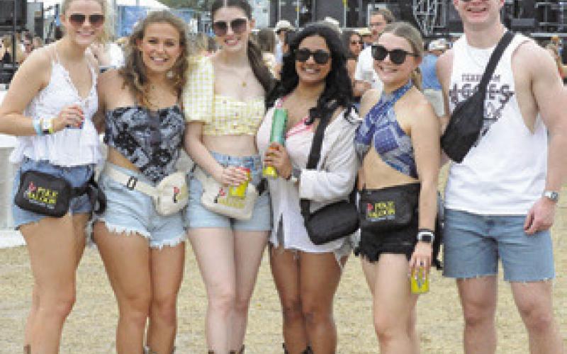 THIS GROUP TOOK TIME TO pose for a photo while attending Chilifest last Saturday in Snook. -- Tribune photo by Denise Squier