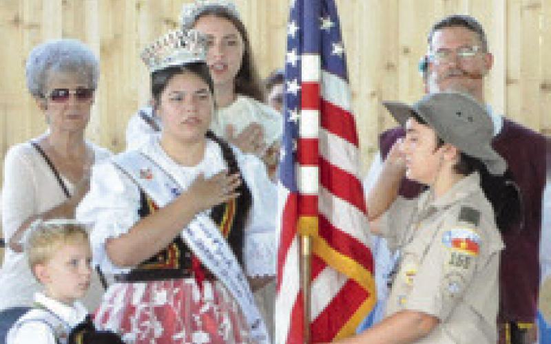 BOY SCOUT TROUPE 181 helped lead those attending the Opening Ceremonies of the Kolache Festival in the Pledge of Allegiance. Tribune photo by Denise Squier