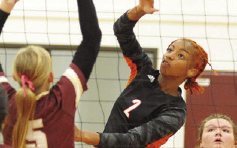 SOMERVILE’S RA’MAYA CARTER gets one of her 14 kills against Milano last Friday night. -- Tribune photo by Denise Squier