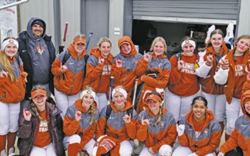 THE LADY HORNETS CELEBRATE their win over Tidehaven on Saturday after a cold day at Lady Hornet Field. Caldwell was one of the sites for the 2024 Texas High School Softball Leadoff Classic which was put on by the National Fastpitch Coaches Association.