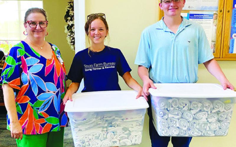 MEMBERS OF THE TEXAS A&amp;amp;M University Collegiate Farm Bureau partnered up with the fourth and fifth-grade at Snook Elementary to create non-slip socks with puff paints and original designs. The socks were later donated to residents at the Burleson St. Joseph Manor in Caldwell.