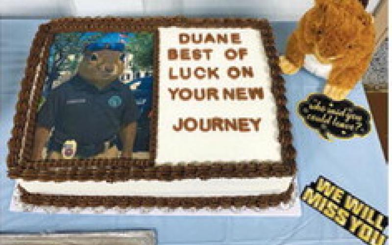 A GOODBYE cake was presented to Duane Strnage at the Monday commissioners meeting.