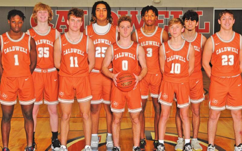 THE 2021-2022 CALDWELL HIGH SCHOOL HORNET varsity basketball team is, from left, Jamar Hewitt, Harrison Novak, Jamin White, Delvin Morris, Jace Aly, Trey Burns, Travis Cunningham, Zack Heaton and Ian Recio. -- Photo courtesy of Dianne Pursch Photography