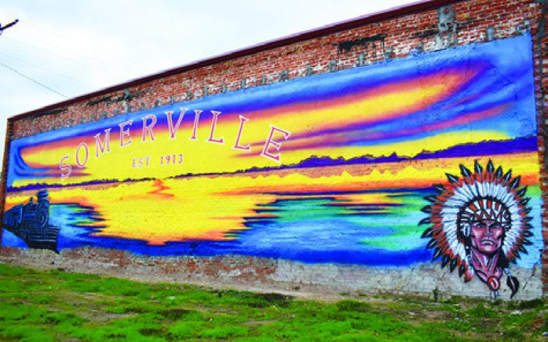 THIS MURAL PAINTED by Linda Hinojosa of Houston is pictured at 150 Eighth Street in Somerville on the back wall of the fire department. A ribbon cutting is planned for Thursday. See story inside.