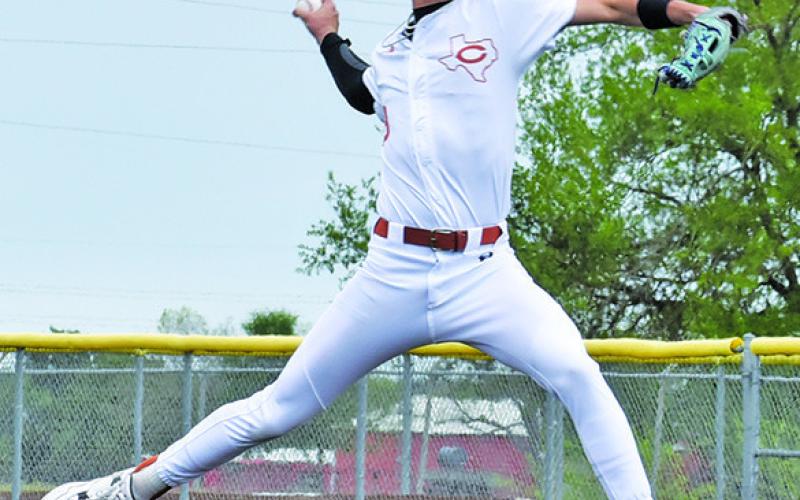 SHANE CLEMENTS of Caldwell hurls this pitch against Smithville on Saturday. Tribune photo by Roy Sanders