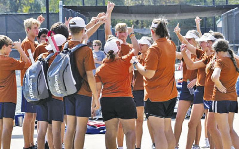 THE CALDWELL TENNIS TEAM gets ready to play Center in the area round of the UIL Team Tennis Playoffs.