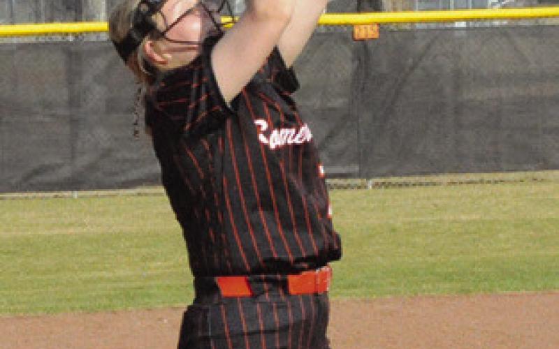 AUDREY SCHOENBERG catches a pop fly at third during the Lady Yeguas’ 12-7 win over Leon last Thursday afternoon. Tribune photo by Denise Squier