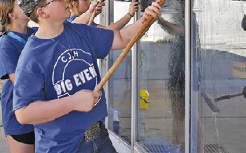 CALDWELL JUNIOR High students washed windows in downtown Caldwell during the school’s annual Big Event, which was Friday.