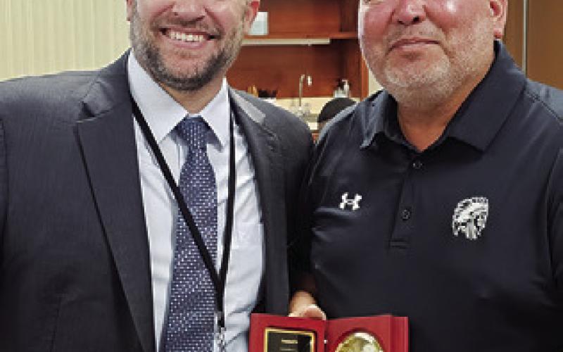 SOMERVILLE ISD presented outgoing board member Joe Gonzales with this clock, honoring his nine years ofservice on the board.