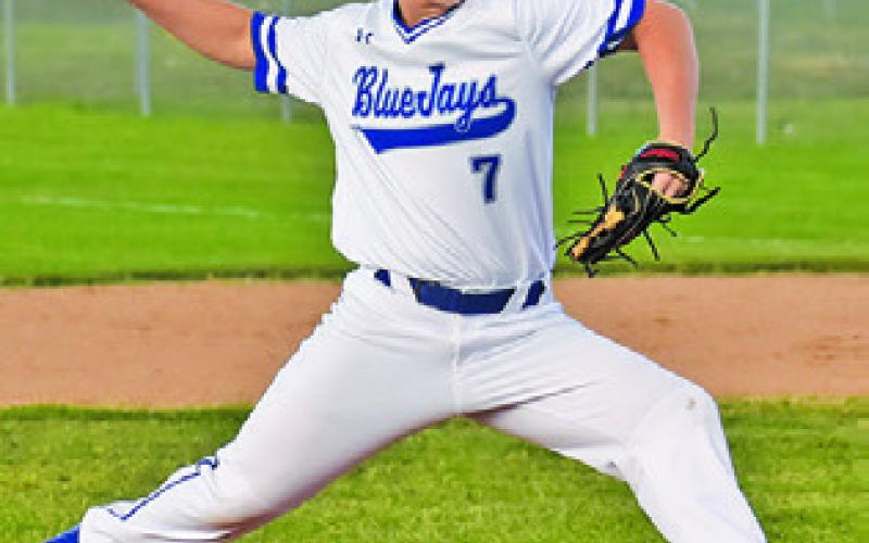 SNOOK’S BONHAM Bosley pitches against Burton last Friday in Snook. Tribune photo by Roy Sanders