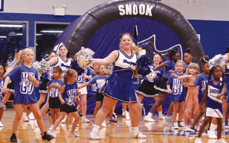 SNOOK CHEERLEADERS AND campers from the Snook Cheer Camp performed a dance routine at last week’s “Meet the Bluejays.”