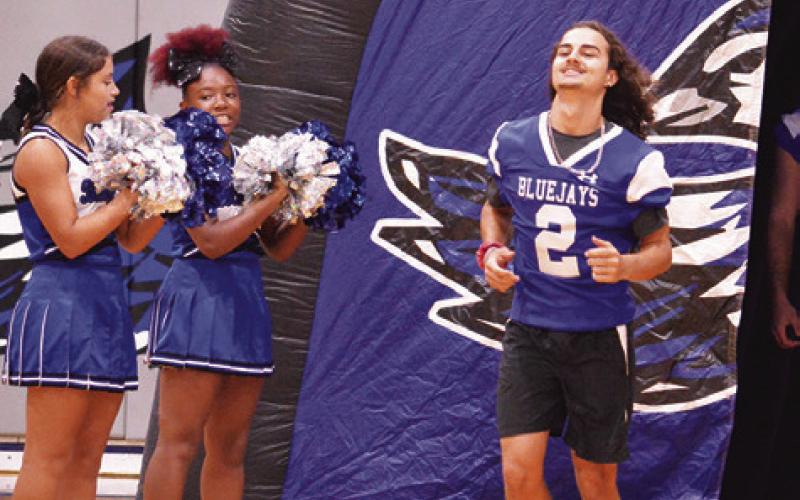 SNOOK’S TRISTAN YEN exits the tunnel as he was announced at last week’s “Meet the Bluejays.” -- Tribune photo by Kim Hutcheson