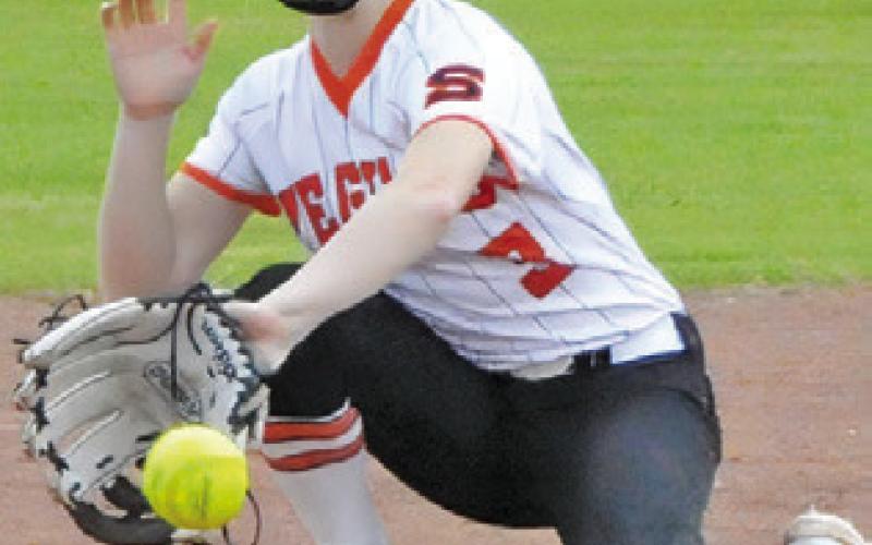 AUBREY FLENCHER catches a low throw at second during the Lady Yegua Softball Tournament. -- Tribune photo by Denise Squier