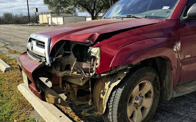 MCKAY’S MOTHER’S TRUCK sustained damage after a one-vehicle incident that occurred on the same day as the fire. Photo courtesy of Liz McKay