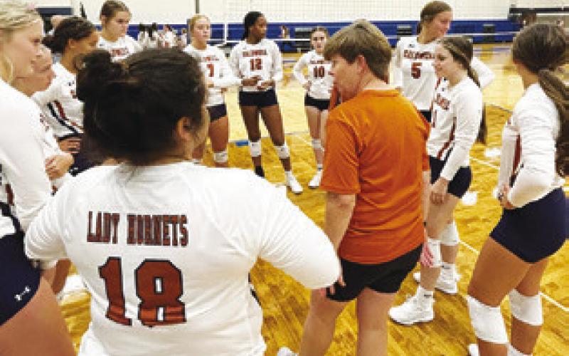 CALDWELL COACH WENDY WEISS gives the Lady Hornets a pep talk during their game against Somerville last Saturday morning at the Anderson-Shiro Volleyball Tournament.