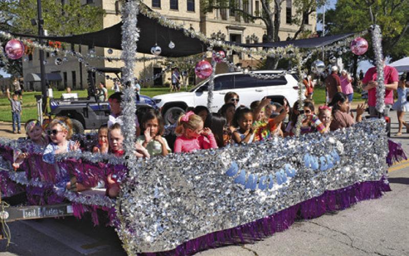 KICE’S ELITE DANCE CENTER’S float won the business category in last Saturday’s Burleson County Fair Parade in downtown Caldwell. Tribune photo by Roy Sanders