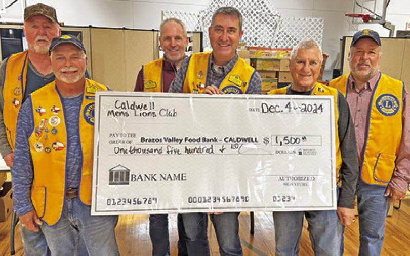 THE CALDWELL MEN’S Lions Club presented a $1,500 check to the Food for Families Food Drive. The club appreciates the local community who purchased raffle tickets helping to support area causes such as this. Pictured, from left, are Danny Jones, Donnie Cook, Kavon Novak, Tony and Sal Zaccagnino and Cody Chenault.