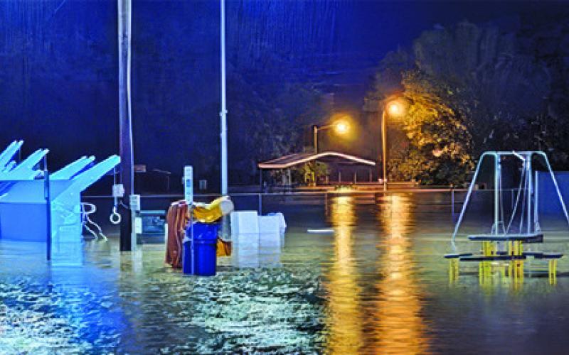 THE PLAYGROUND AREA AT John E. Hejl Park at Davidson Creek was under water Sunday night after storms hit Burleson County causing flooding in many areas.